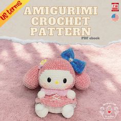 a crocheted hello kitty doll sitting on top of a pink blanket with the caption amigurmi crochet pattern