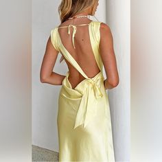 Decided To Go With A Different Dress For A Wedding This Summer! Tags Are Still On! Spring Wedding Silk Backless Dress, Elegant Yellow Satin Midi Dress, Spring Dinner Backless Dress With Tie Back, Silk Backless Dress For Summer Wedding, Summer Wedding Silk Backless Dress, Satin Midi Dress With Back Opening For Wedding, Sleeveless Tie Back Midi Dress For Wedding, Satin Tie Back Dress For Dinner, Spring Tie Back Maxi Dress For Dinner