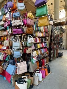 many purses and handbags are on display