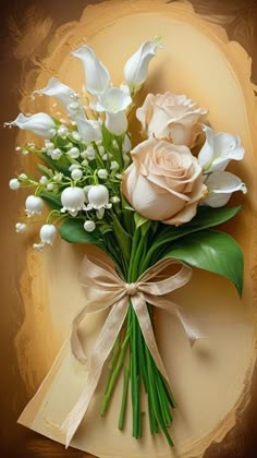 a bouquet of white flowers on top of a piece of paper with a ribbon around it