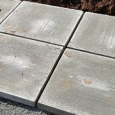 the cement is being laid out on the ground to be used as a planter