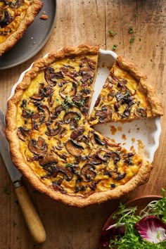 a quiche with one slice missing from it