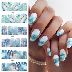 Nail Art Water Decals ** Please select your design from the drop down menu list ** One sheet of Nail Art Water Decals. Size of Sheet (outside Retail Packaging): 6.5cm x 5.3cm (approx.). HOW TO USE NAIL WATER DECALS To use water transfers; 1.) Paint your nails & allow them to dry. 2.) Cut out the design that you want to use. 3).Put the water decal sheet into a bowl of water. 4.) The decals will become loose from the backing after 20-40 seconds you. 5.) When easily removable from the backing paper pick up a decal with tweezers & position on the nail (make sure you do not put them on back to front - the colourful side must face outwards or you will end up with a backwards white wash design). 6.) When you have completed the nail leave to dry for 2-4 minutes & seal by applying 2 coats of good q Blue Marble Nails With Gold Flakes, Water Nails Design, Water Nail Art, Marble Runs, Nail Polish Painting, Hot Nail Designs, Aqua Nails, Nail Water Decals, Water Nails