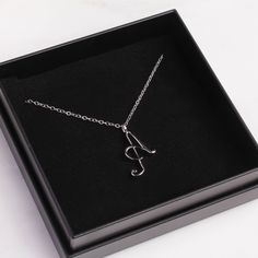 "Letter A Initial Necklace - Cursive \"A\" initial silver pendant - Personalized initial silver pendant for women / Gift for her / for mom Dainty \"A\" initial. Perfect every day necklace. Lovely gift for your self, sister, bridesmaids, new mom. Convo me if you would like to customize the length of the chain. The possibilities are endless. Pendant: Base metal is brass and 16K gold plated. Chain is 18 inches, sterling silver. (if you would like a longer or shorter chain, please contact us to cust Sterling Silver Initial Pendant Charm Necklace For Mom, Silver Initial Pendant Necklace For Mom, White Gold Initial Pendant Name Necklace As Gift, White Gold Initial Pendant Necklace For Gift, Silver Hypoallergenic Initial Pendant Charm Necklace, Silver Hypoallergenic Charm Necklace With Initial Pendant, Silver Hypoallergenic Initial Pendant Charm Necklaces, Hypoallergenic Silver Charm Necklace With Initial Pendant, Hypoallergenic Silver Initial Pendant Charm Necklaces