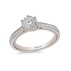 a diamond engagement ring on a white background