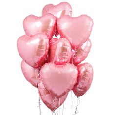 a bunch of pink heart shaped balloons