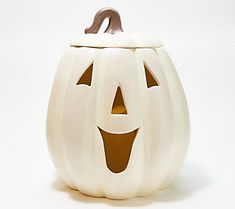 a carved pumpkin with a smile on it's face