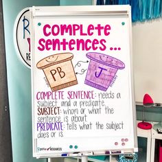 a white board with writing on it in front of a sign that says complete sentences