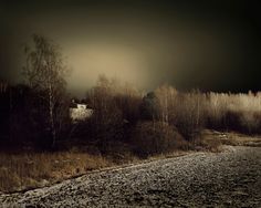 an old abandoned house in the woods at night