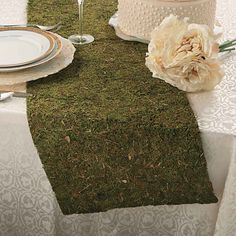 Moss Table Runner | Oriental Trading Enchanted Forest Prom, Moss Table Runner, Moss Table, Enchanted Forest Baby Shower, Party Buffet Table, Fairy Baby Showers, Buffet Table Decor, Chic Birthday Party, Fairy Garden Birthday Party