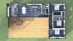 an overhead view of a house with the living room and dining area visible from above