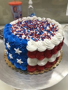 a cake decorated with red, white and blue icing