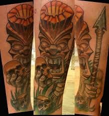 three different tattoos on the legs of men with skulls and swords in front of them