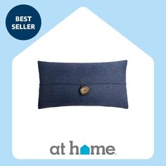 a blue pillow with a button on it and the words best seller at home below