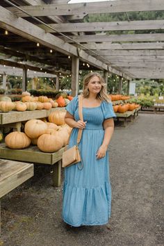 Stay stylishly comfortable with our Smocked Chambray Puff Sleeve Midi Dress. The smocked design perfectly hugs your curves while the puff sleeves add a playful touch. Made with high-quality chambray fabric for a lightweight and breathable feel, this dress is perfect for your dressier fall occasions. Soft woven chambray fabric Stretchy smocked bodice Square neckline Short puff sleeves Midi length Ruffle detail on skirt Sizing: Small- 0/1-4/5 Medium- 6/7-8/9 Large- 10/11-12/13 Kait is 5’3”, size 1 Puff Sleeve Midi Dress, Chambray Fabric, Sleeve Midi Dress, Square Necklines, Square Neckline, Puff Sleeves, Chambray, Midi Length, Smocking