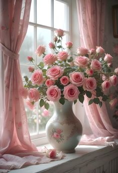 a vase filled with pink roses sitting on top of a window sill next to curtains