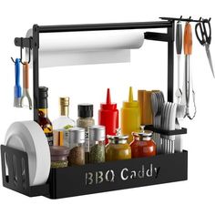 an image of a bbq caddy with all kinds of cooking utensils