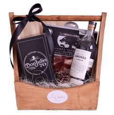 a wooden box filled with wine and liquor