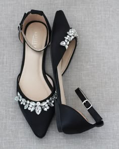 "Embellished pointy toe flats with sparkly row of teardrop rhinestones across toe and detachable ankle strap. Comfort with simplicity perfect for brides and bridesmaids. YOU CAN CHOOSE STYLE OF ANKLE STRAP AT CHECKOUT Details: Colors available: Black, Blush, Burgundy, Champagne, Light Blue, Navy, Red, Royal Blue, Ivory, and White UPPER: Synthetic upper and lining MATERIALS: Mandmade outsole STYLE NAME: BELLA SIZE FIT: RUNS LARGE, ORDER HALF SIZE DOWN FROM YOUR NORMAL SIZE Not sure of which size Black Wedding Shoes Flats, Evening Flats With Rhinestones And Pointed Toe, Formal Closed Toe Flats With Rhinestones, Flat Heel Wedding Shoes With Rhinestones For Prom, Flat Wedding Shoes With Rhinestones, Elegant Closed Toe Flats With Rhinestones, Wedding Flats With Rhinestones And Flat Heel, Formal Pointed Toe Flats With Rhinestones, Wedding Flats With Rhinestones