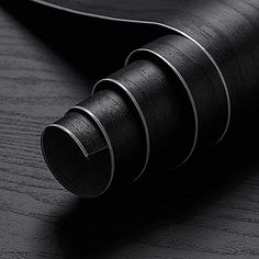 a close up of a black object on a table