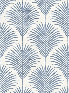 a blue and white wallpaper with palm leaves