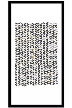 a black and white abstract art print with gold dots on the bottom, in a black frame