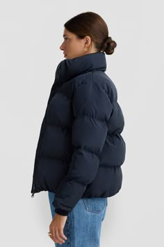 The Original Puffer Jacket Navy is ideal for those seeking a minimalist aesthetic this Winter. Offering less prominent branding, this Puffer is a staple for every woman's wardrobe. Water resistant fabrication Fully lined Thick wadding for complete warmth Double ended zipper with powder coated press snaps for lapped closure In seam pockets with cosy fleece lining Ribbed cuff on sleeve 100% Polyester Designed in Australia. Made in China. Thick Winter Jackets, Winter Outfits Down Jacket, Aesthetic Winter Jackets Women, Sweaters For Winter, Winter Jacket Outfits Women, Winter Jackets 2024, Winter Jackets Women Aesthetic, Winter Coats 2024, Model Off Duty Style Winter