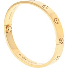 Experience the harmony of tradition and innovation, where luxury is redefined in the Elegant 18K Yellow Gold Love Bangle Bracelet with Screwdriver from Cartier. This exquisite pre-owned piece is crafted to perfection, showcasing the timeless allure of yellow gold in a size 16 design. The bracelet is accompanied by a convenient screwdriver for easy adjustments, ensuring a comfortable and secure fit for the wearer.Indulge in the elegance of this Cartier Love bangle, a symbol of everlasting commitment and style. The 18K yellow gold exudes a radiant glow, complementing any outfit with its luxurious appeal. Whether worn alone as a statement piece or paired with other accessories, this bracelet is a versatile addition to any jewelry collection.Embrace the excellence of Cartier craftsmanship with Luxury Cartier Bangle For Wedding, Cartier Bangle Smooth, Luxury Classic Yellow Gold Leather Bracelet, Cartier Love Bangle, Love Bangle, Cartier Love, Metal Bracelets, Signature Design, Estate Jewelry