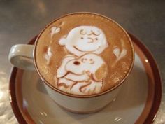 a cappuccino with an image of a monkey on it