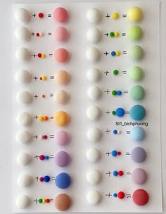 an array of different colored balls on a white surface with the numbers 1, 2, 3 and 4