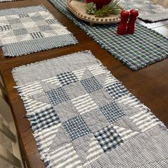 the table is set with blue and white placemats