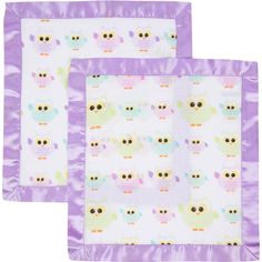 two purple place mats with owls on them