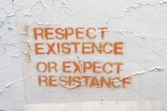 a sign on the side of a building that says, respect existence or expect resistance