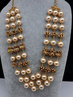 Golden Nakshi Ball Pearls Triple Layer Necklace only mala no earringsColor : Golden MatteSize : Necklace Length : 18 Inches;Stones : Golden Balls Pearls Luxury Kundan Necklace With Pearl Drop For Celebrations, Luxury Round Beads Necklaces For Diwali, Luxury Traditional 8mm Beaded Necklaces, Luxury Bridal Necklace With Gold Beads For Wedding, Luxury Round Beads Necklace For Diwali, Luxury Kundan Necklace With Pearl Pendant For Formal Events, Luxury Round Beads Necklaces For Puja, Luxury Traditional Beaded Necklace With Dangling Beads, Luxury Temple Jewelry Necklaces With Polished Beads