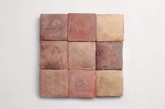 several square tiles arranged on top of each other