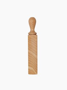 a wooden pepper mill on a white background