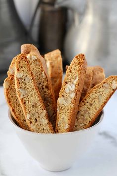 several pieces of bread in a white bowl