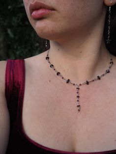 A hauntingly beautiful and elegant goth style necklace made with stainless steel and garnet crystal. This necklace is chic, cool and unique, the perfect gift for yourself or for your friend who loves dark red.  length: 42cm + 5 cm extender Message me if you have any questions :)  Love  Cathrine Vilain  Vilain Jewelry Elegant Goth, Jewelry Goth, Witch Necklace, Goth Necklace, Garnet Crystal, Goth Style, Goth Jewelry, Necklace Beads, Witchy Jewelry