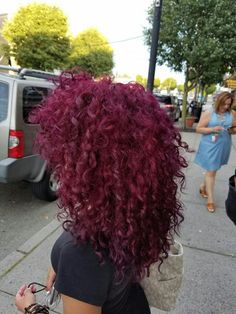 Color Dyed Curly Hair, Unique Dyed Curly Hair, Curly Dyed Hair Purple, Dark Dyed Curly Hair, Curly Hair With Colored Tips, Fun Color Curly Hair, Cute Curly Hair Colors, Purple Hair On Curly Hair, Solid Hair Color Ideas For Curly Hair