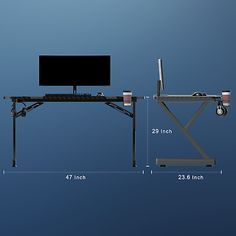 a computer desk with a monitor and keyboard on it, measurements for the height of the table