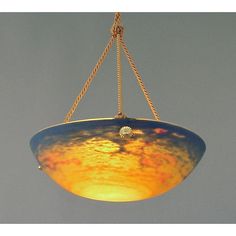 a hanging light that is made out of glass and has a chain attached to it