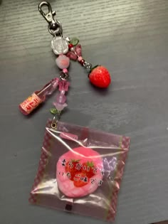 Japanese food, strawberry bread squishy keychain! 🍓  The strawberry bread charms packaging is plastic and the bread inside is a mochi (as far as I know), the strawberry charm is plastic or acrylic, and the ramune bottle is acrylic.  Some beads are glass Please note! Your order may be packed on Instagram (@chnjwls)  I have 4 dogs 2 shed (they live outside though) the chances of having animal fur are unlikely but it's still possible. Everything is handmade with care and love, comes with freebies! Ramune Bottle, Charms Packaging, Trinket Keychain, Squishy Keychain, Japanese Keychain, Mommy Milkers, Bread Squishy, Food Strawberry, Food Keychain