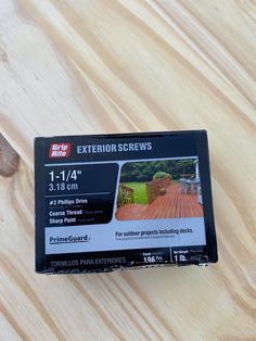 a package of wood decking sitting on top of a wooden table