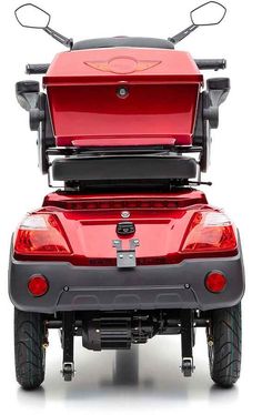 the back end of a red four wheeled vehicle