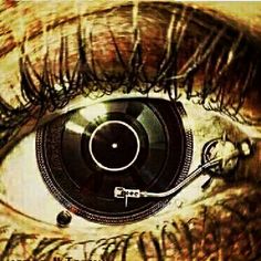 an eye with the record player in it's irise, looking into the camera