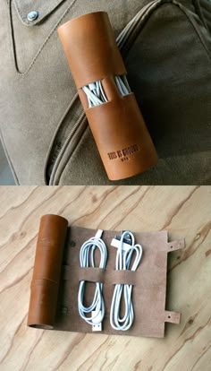 a brown leather case sitting on top of a wooden table next to an open bag