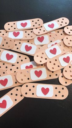 several pieces of paper with hearts on them