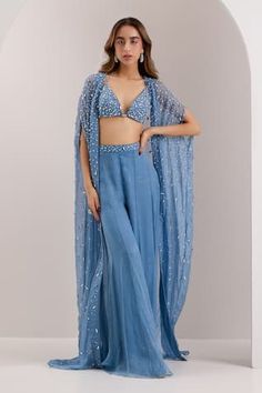 Blue sheer cape embellished by crystal, jewel and bead scatter motifs. Comes with bead-crystal embellished bralette and palazzo. - Aza Fashions Palazzo Pants Indian, Blouse Organza, Sheer Cape, Blue Organza, Crystal Embroidery, Vacuum Storage, Chic Pants, Palazzo Set, Blue Sheers