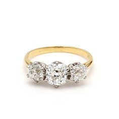 three stone diamond ring in 18ct yellow and white gold, circa 1950's