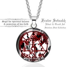 a red and black necklace with an inverted design on the front, surrounded by other symbols